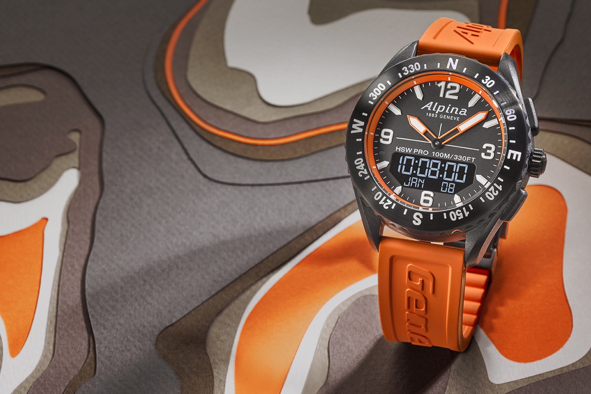 Zegarek sportowy Alpina na pomarańczowej bransolecie